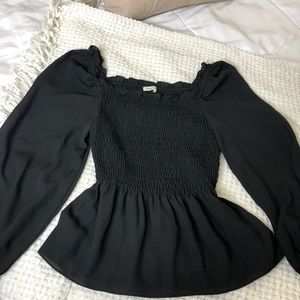 Smocked waist blouse with long puffy sleeves